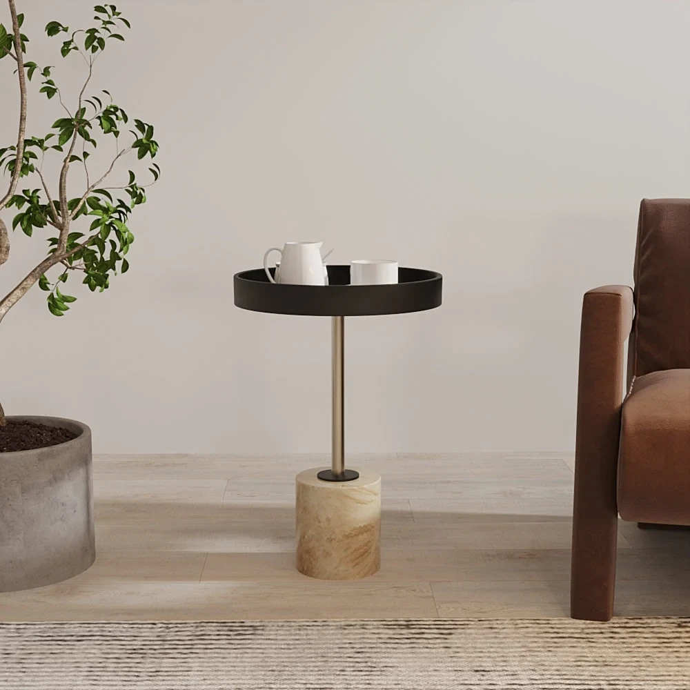 A side table with a black round tray top, a brass stem and a travertine cylinder base.