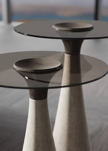 Smoked glass tops on cone shaped stone bases with wood caps.